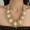 Celestial Orbit – A Golden Wrapped Orb Statement Necklace