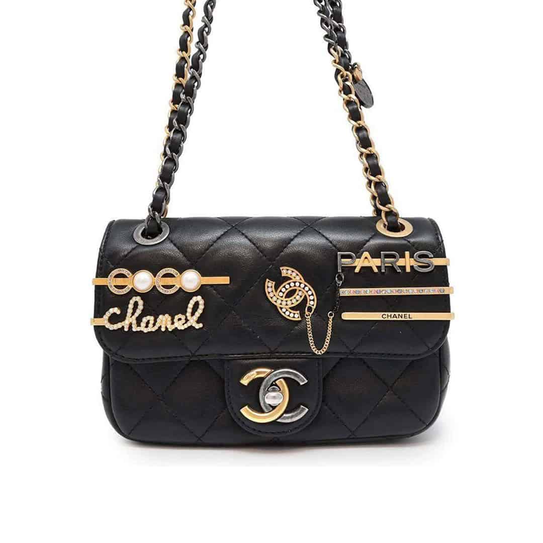 CNL MATELASSE CHARM SLING BAG